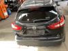 Wielnaaf achter Nissan Qashqai+2