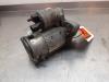Startmotor van een Toyota Avensis Wagon (T27) 2.0 16V D-4D-F 2011