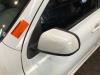 Buitenspiegel links van een Nissan Micra (K13) 1.2 12V DIG-S 2013