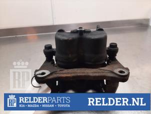 Gebruikte Remklauw (Tang) links-voor Mazda CX-7 2.2 MZR-CD 16V Prijs € 35,00 Margeregeling aangeboden door Relder Parts B.V.