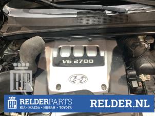 Gebruikte Motor Hyundai Tucson (JM) 2.7 V6 24V 4x4 Autom. Prijs € 900,00 Margeregeling aangeboden door Relder Parts B.V.