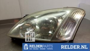 Gebruikte Linker Koplamp Toyota Corolla (E12) 2.0 D-4D 16V 116 Prijs € 50,00 Margeregeling aangeboden door Relder Parts B.V.