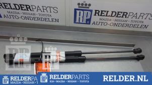 Gebruikte Set Gasdempers Achterklep Nissan Micra (K13) 1.2 12V Prijs € 25,00 Margeregeling aangeboden door Relder Parts B.V.