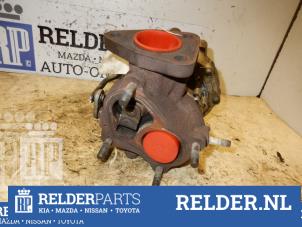 Turbo van een Toyota Corolla (E12) 2.0 D-4D 16V 90 2002