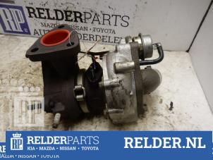 Turbo van een Toyota Corolla (E12) 2.0 D-4D 16V 90 2002