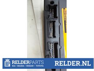 Module Bodycontrol van een Nissan Almera Tino (V10M) 2.0 16V CVT 2003