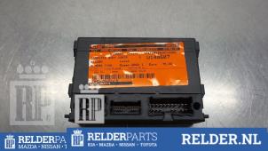 Module Bodycontrol van een Nissan Almera Tino (V10M) 2.0 16V CVT 2003