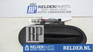 Gebruikte Deurgreep 4Deurs rechts-achter Nissan Almera (N16) 1.8 16V Prijs € 23,00 Margeregeling aangeboden door Relder Parts B.V.