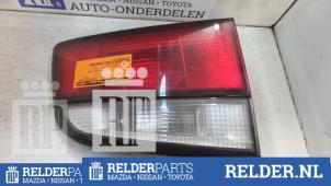 Gebruikte Achterlicht links Mazda 626 (GW19) 2.0i 16V HiPower Prijs € 23,00 Margeregeling aangeboden door Relder Parts B.V.