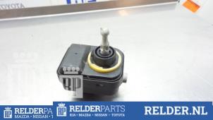Gebruikte Motor Koplamp Nissan Micra (K12) 1.2 16V Prijs € 23,00 Margeregeling aangeboden door Relder Parts B.V.