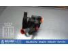 Stuurbekrachtiging Pomp Mazda 323