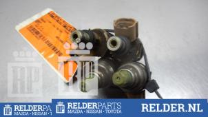 Gebruikte Injector (benzine injectie) Mazda 323 Fastbreak (BJ14) 1.8 GLX,GT 16V Prijs € 45,00 Margeregeling aangeboden door Relder Parts B.V.