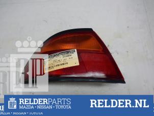 Gebruikte Achterlicht links Mazda 323 F (BA14) 1.5i GLX,GT 16V Prijs € 23,00 Margeregeling aangeboden door Relder Parts B.V.