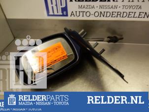 Gebruikte Buitenspiegel rechts Mazda 121 (JA/JB) 1.25i 16V Prijs € 23,00 Margeregeling aangeboden door Relder Parts B.V.