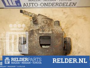 Gebruikte Remklauw (Tang) rechts-voor Mazda 121 (JA/JB) 1.25i 16V Prijs € 45,00 Margeregeling aangeboden door Relder Parts B.V.
