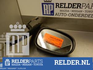 Gebruikte Spiegel Buiten links Nissan Almera (N16) 1.5 16V Prijs € 23,00 Margeregeling aangeboden door Relder Parts B.V.