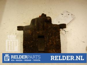 Gebruikte Remklauw (Tang) links-voor Nissan Micra (K11) 1.5 D Prijs € 32,00 Margeregeling aangeboden door Relder Parts B.V.