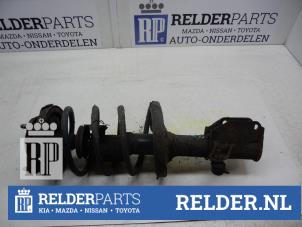 Gebruikte Veerpoot links-achter Mazda 323 Fastbreak (BJ14) 1.5 LX,GLX 16V Prijs € 32,00 Margeregeling aangeboden door Relder Parts B.V.