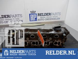 Gebruikte Cilinderkop Nissan Almera Tino (V10M) 2.2 Di 16V Prijs € 135,00 Margeregeling aangeboden door Relder Parts B.V.