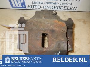 Gebruikte Remklauw (Tang) links-voor Nissan Almera (N16) 2.2 Di 16V Prijs € 25,00 Margeregeling aangeboden door Relder Parts B.V.