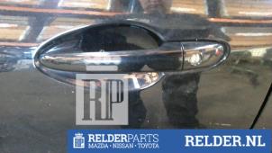 Gebruikte Portiergreep 2Deurs links Mazda 2 (DE) 1.5 16V S-VT Prijs € 23,00 Margeregeling aangeboden door Relder Parts B.V.