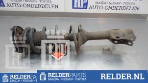 Gebruikte Schokdemperpoot links-voor Toyota Yaris Verso (P2) 1.5 16V Prijs € 41,00 Margeregeling aangeboden door Relder Parts B.V.