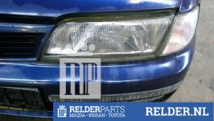 Gebruikte Koplamp links Nissan Almera (N15) 1.4 LX,GX,S 16V Prijs € 32,00 Margeregeling aangeboden door Relder Parts B.V.