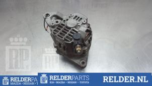 Gebruikte Dynamo Nissan Almera Tino (V10M) 2.0 16V CVT Prijs € 25,00 Margeregeling aangeboden door Relder Parts B.V.