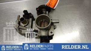 Gebruikte Gasklephuis Mazda 323 C (BA13) 1.3i 16V Prijs € 54,00 Margeregeling aangeboden door Relder Parts B.V.