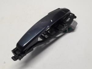 Gebruikte Portiergreep 4Deurs rechts-voor Opel Corsa D 1.4 16V Twinport Prijs € 15,75 Margeregeling aangeboden door Reclycar De Boer BV