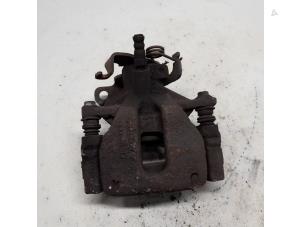 Gebruikte Remklauw (Tang) links-achter Ford Transit 2.2 TDCi 16V Prijs € 52,50 Margeregeling aangeboden door Reclycar De Boer BV