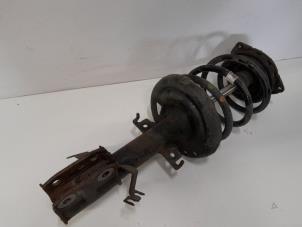 Gebruikte Schokdemper links-voor Renault Grand Scénic III (JZ) 1.4 16V TCe 130 Prijs € 42,00 Margeregeling aangeboden door Reclycar De Boer BV