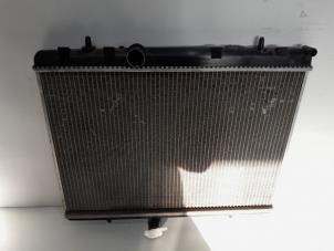 Gebruikte Radiateur Peugeot 308 CC (4B) 1.6 16V THP 150 Prijs € 26,25 Margeregeling aangeboden door Reclycar De Boer BV