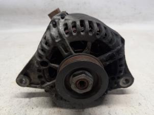 Gebruikte Dynamo Nissan Micra (K12) 1.2 16V Prijs € 36,75 Margeregeling aangeboden door Reclycar De Boer BV