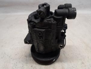 Gebruikte Aircopomp Nissan Micra (K12) 1.2 16V Prijs € 78,75 Margeregeling aangeboden door Reclycar De Boer BV