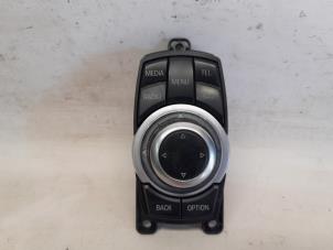 Gebruikte Multi Media Regelunit BMW 3 serie Touring (F31) 320d 2.0 16V Prijs € 105,00 Margeregeling aangeboden door Reclycar De Boer BV