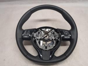 Gebruikte Stuurwiel Toyota Yaris III (P13) 1.5 16V Hybrid Prijs € 78,75 Margeregeling aangeboden door Reclycar De Boer BV