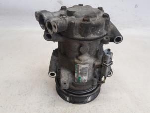 Gebruikte Aircopomp Renault Clio III (BR/CR) 1.2 16V 75 Prijs € 78,75 Margeregeling aangeboden door Reclycar De Boer BV