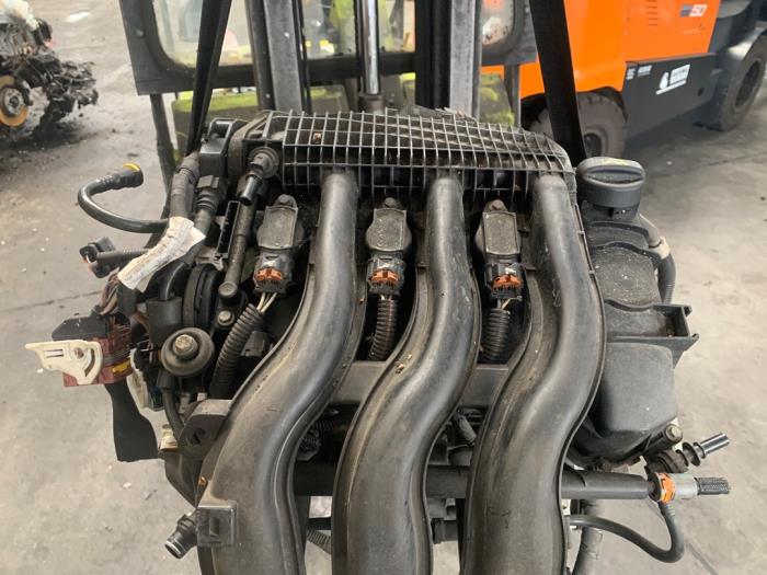 Motor van een Peugeot 308 (L3/L8/LB/LH/LP) 1.2 12V VTi PureTech 82 2014