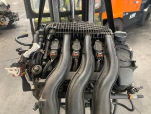 Motor van een Peugeot 308 (L3/L8/LB/LH/LP) 1.2 12V VTi PureTech 82 2014