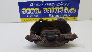 Gebruikte Remklauw (Tang) links-voor Ford Focus 3 1.6 EcoBoost 16V Prijs € 30,00 Margeregeling aangeboden door Autorec. Gebr. Prins b.v.