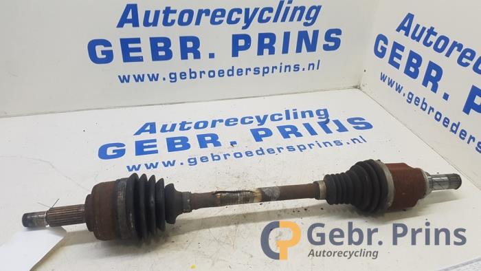 Gebruikte Aandrijfas links-voor Dacia Lodgy (JS/SD0J) 1.6 Sce 100 16V Prijs € 50,00 Margeregeling aangeboden door Autorec. Gebr. Prins b.v.