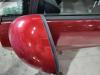 Spiegel Buiten links van een Seat Ibiza IV (6J5) 1.2 TDI Ecomotive 2012
