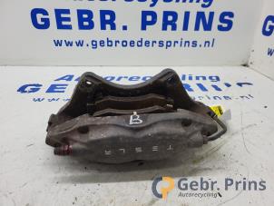 Gebruikte Remklauw (Tang) rechts-achter Tesla Diversen Prijs € 175,00 Margeregeling aangeboden door Autorec. Gebr. Prins b.v.