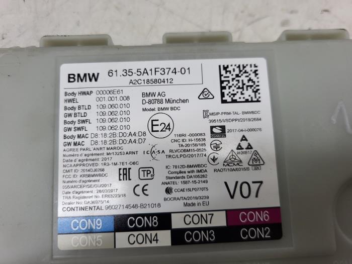 Kontaktslot + computer van een BMW X4 (G02) M40i 3.0 TwinPower Turbo 24V 2021