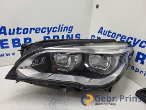 Gebruikte Koplamp links BMW 7 serie (F01/02/03/04) 740d 24V Prijs € 750,00 Margeregeling aangeboden door Autorec. Gebr. Prins b.v.