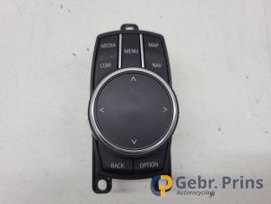 Gebruikte I-Drive knop BMW 2 serie Gran Tourer (F46) 220i 2.0 TwinPower Turbo 16V Prijs € 75,00 Margeregeling aangeboden door Autorec. Gebr. Prins b.v.