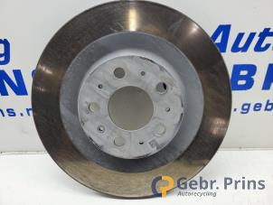 Gebruikte Remschijf achter Tesla Model Y (5YJY) RWD Prijs € 50,00 Margeregeling aangeboden door Autorec. Gebr. Prins b.v.