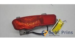 Gebruikte Bumper reflector links-achter Chevrolet Cruze (305) 1.8 16V VVT Prijs € 20,00 Margeregeling aangeboden door Autorec. Gebr. Prins b.v.