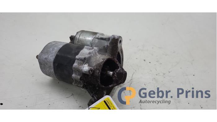 Startmotor van een Peugeot 206+ (2L/M) 1.4 XS 2011